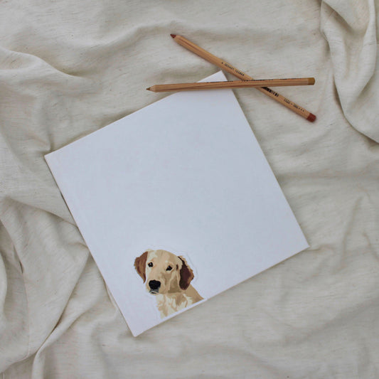 Golden retriever sticker on notebook